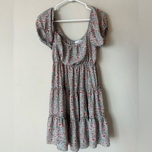 refreshing light blue color, adorned with delicate pink floral patterns